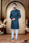 Toddler boy wearing a blue self-design TR kurta with matching polo pyjama pants