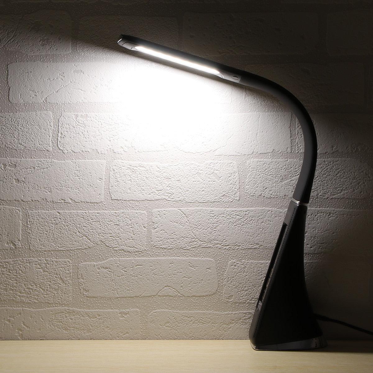 Modern black multifunction LED desk lamp with digital calendar and temperature display.