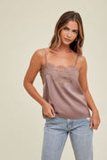 A close-up view of the Midnight satin cami showing the delicate lace trim and scoop neckline.