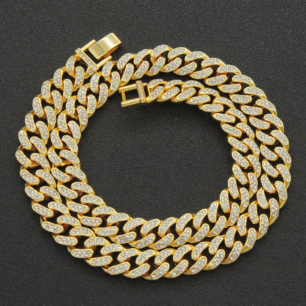 Close up of an iced out geometric Cuban chain necklace with diamond inlay