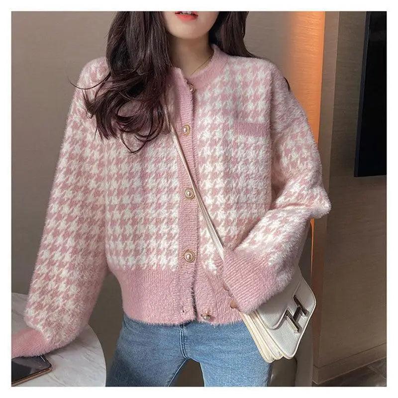 Close-up of a high-quality imitation mink fleece O-neck cardigan with soft knit texture