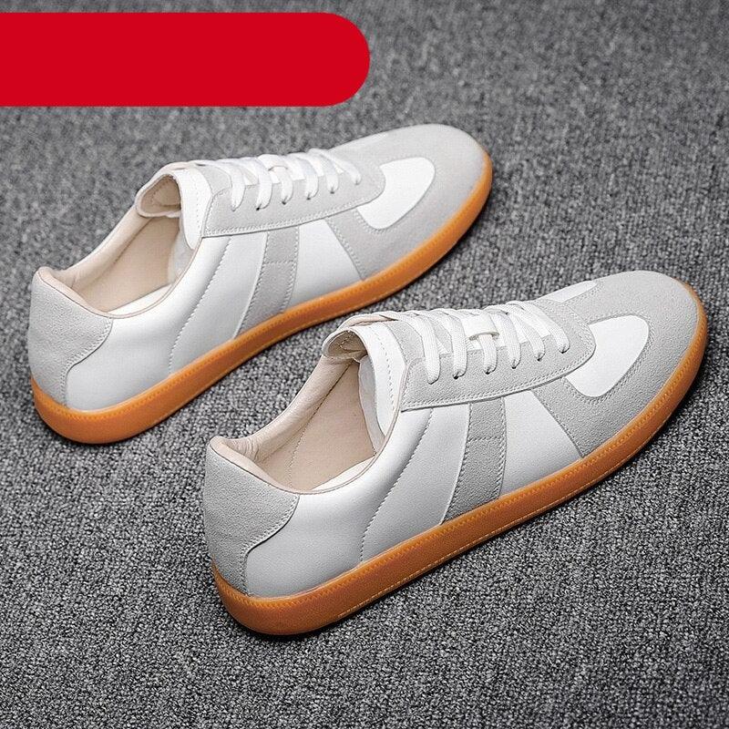 Black, white, and gum leather retro sneakers for men with thick rubber sole