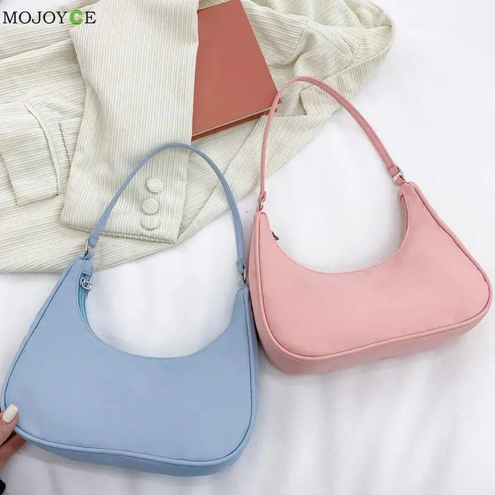 Elegant minimalist solid color shoulder bag with top-handle and zipper closure