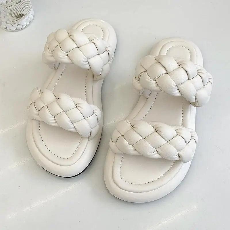 Women's minimalist leather platform sandals in solid white, lavender, and yellow colors.