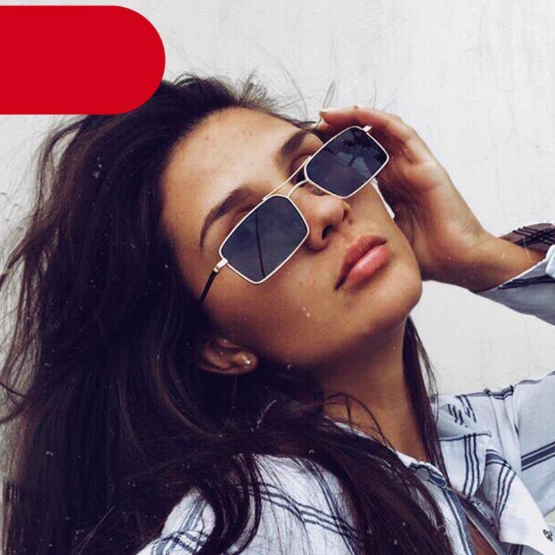 Rimless square sunglasses with delicate gold-tone metal temples on a neutral background