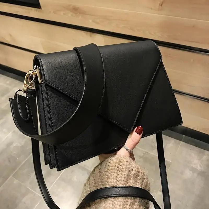 Modern minimalist women's crossbody bag in black and beige PU leather