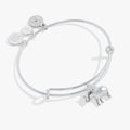 Silver tone elephant charm bangle with trunk raised for luck