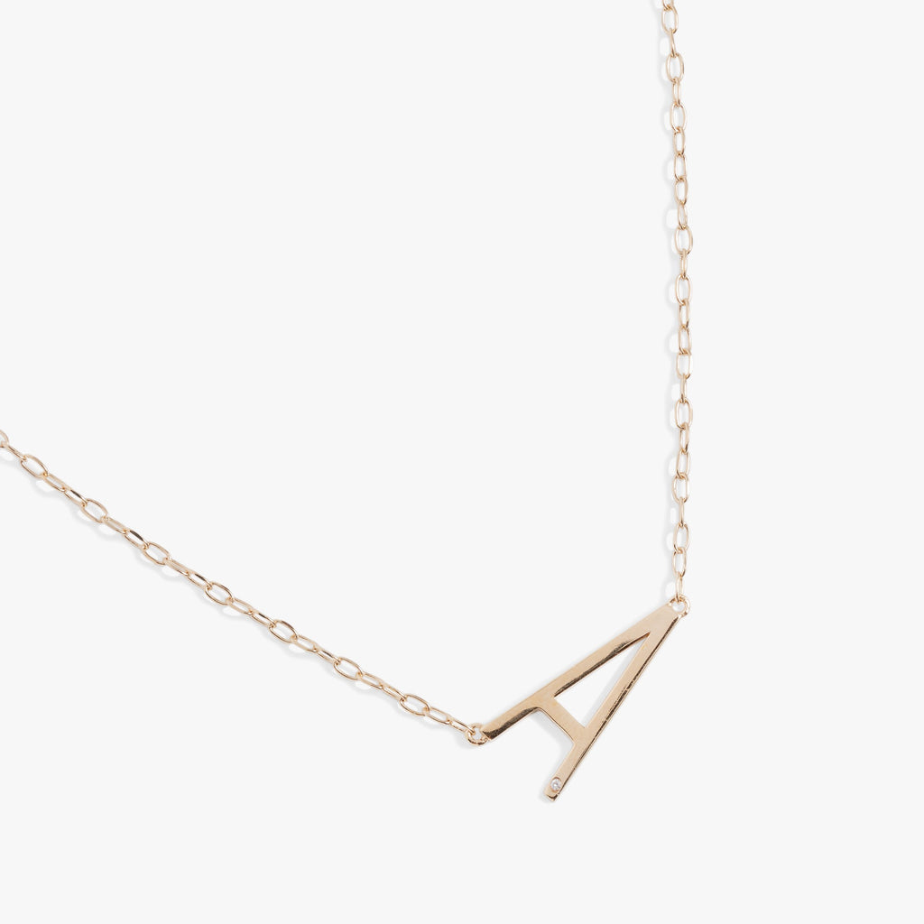 Initial A Sideways Pendant Necklace with Cubic Zirconia Accent