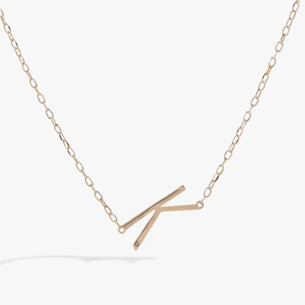 Alex And Ani sideways Initial K pendant necklace with cubic zirconia accent in silver or gold tone