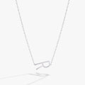 Initial R sideways pendant necklace in sterling silver with a white CZ accent