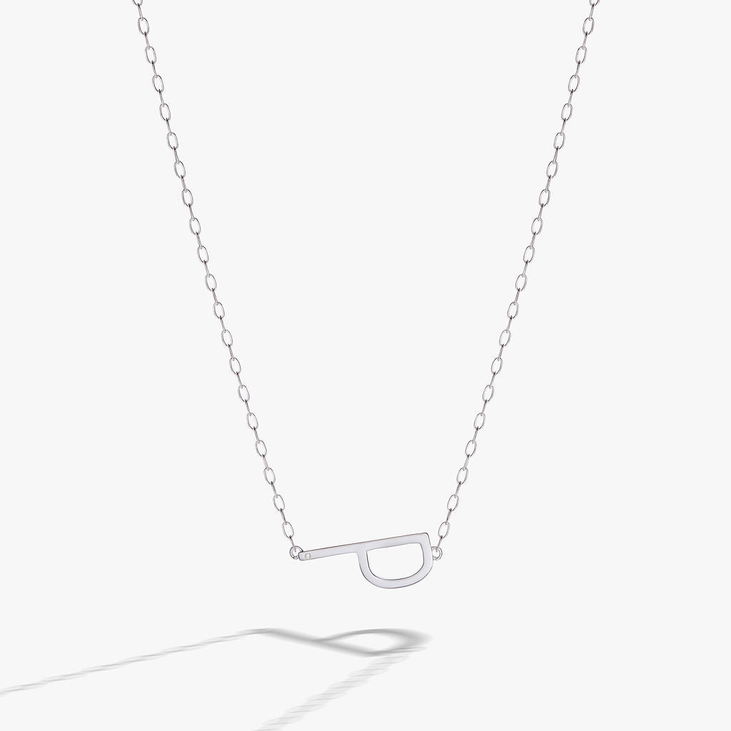 Sideways initial P pendant necklace in silver or gold with cubic zirconia.