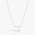 Sideways initial P pendant necklace in silver or gold with cubic zirconia.