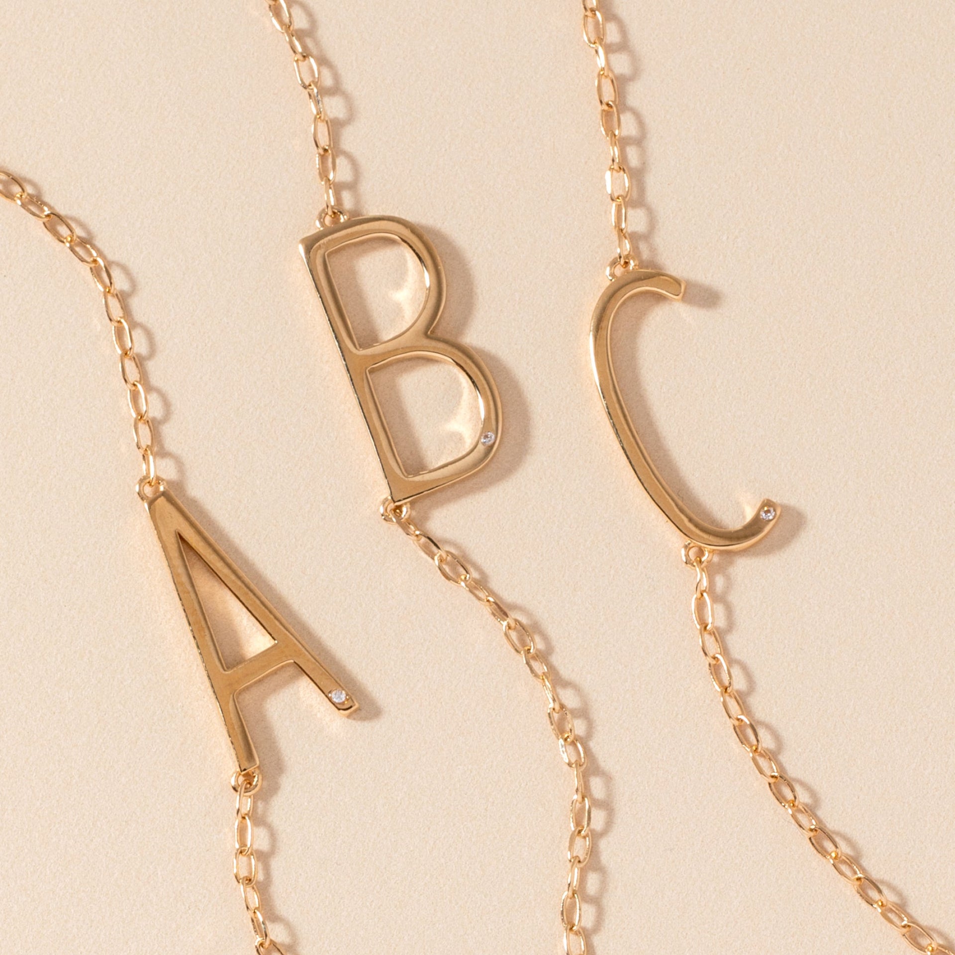 Initial A Sideways Pendant Necklace with Cubic Zirconia Accent