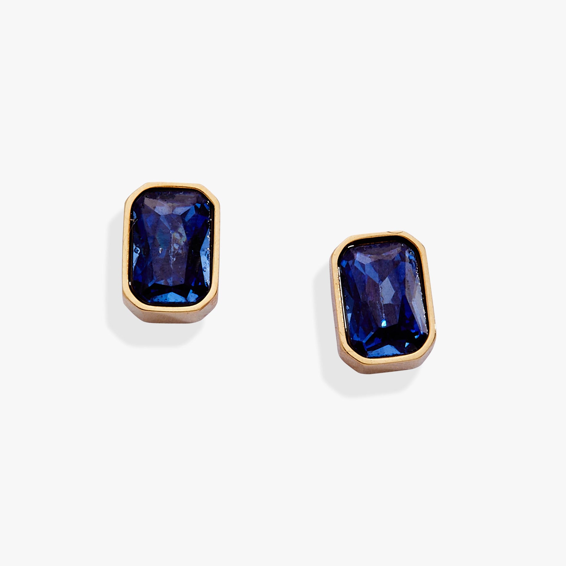 Luxurious emerald-cut sapphire glass stud earrings with bezel setting