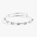April Birthstone Bangle featuring seven emerald-cut clear crystals on an expandable wire band.