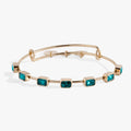 December birthstone expandable wire bangle with seven emerald-cut blue zircon-colored crystals