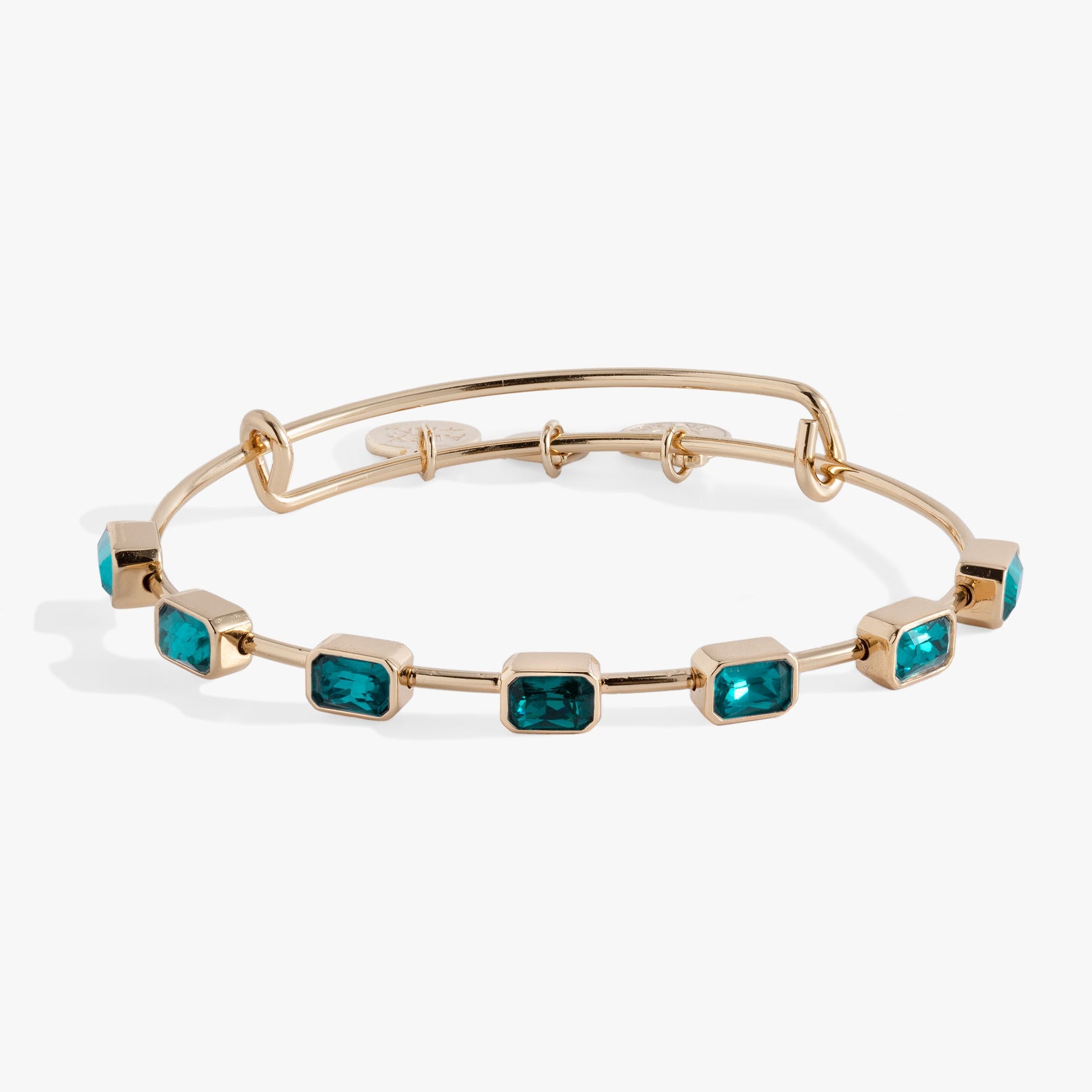December birthstone expandable wire bangle with seven emerald-cut blue zircon-colored crystals