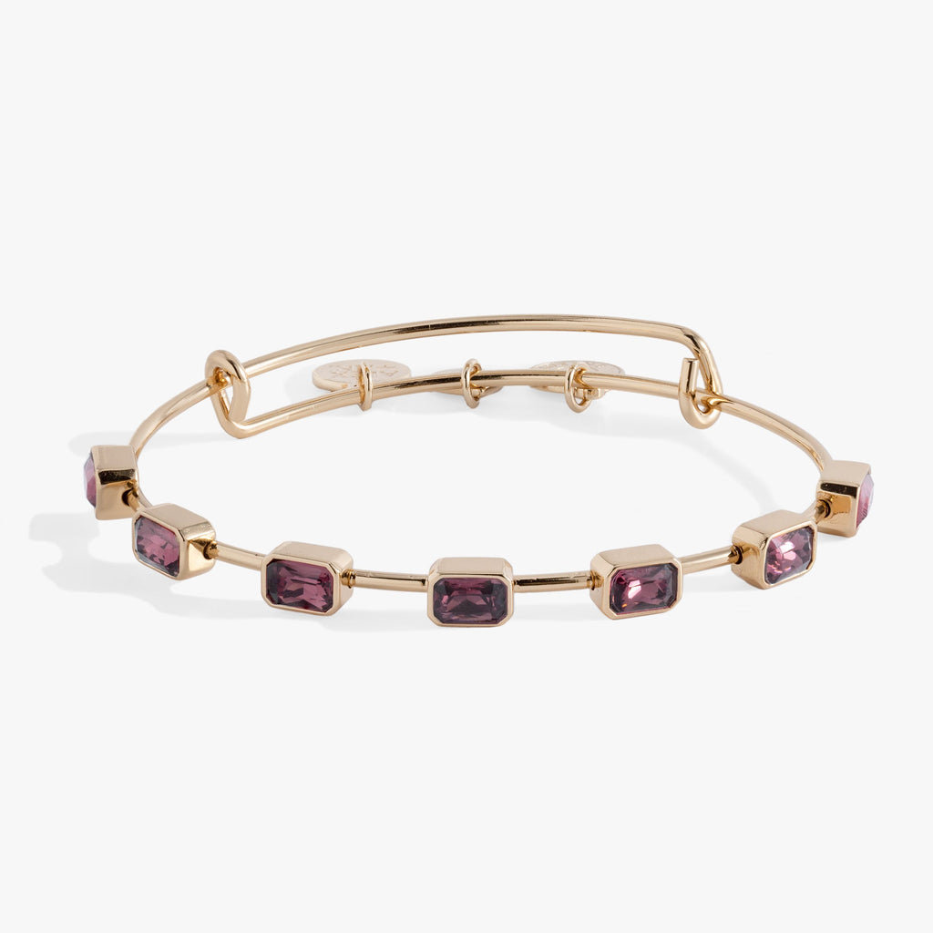 Emerald cut February birthstone bangle with amethyst purple crystals on an expandable wire bracelet