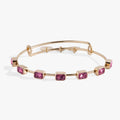 Emerald cut October birthstone bangle with pink crystals on an expandable wire bracelet