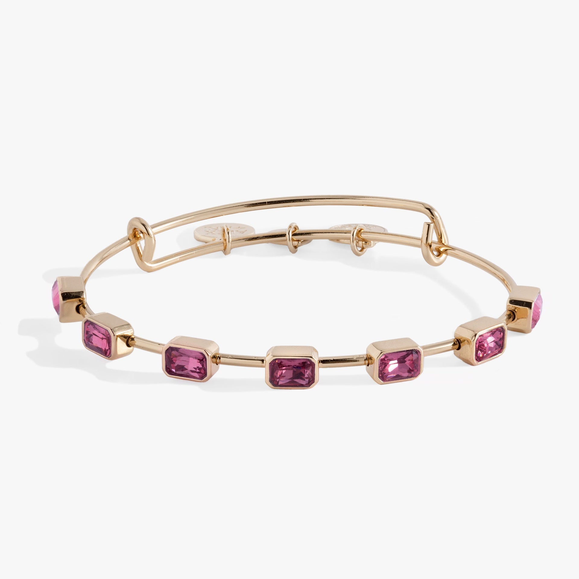 Emerald cut October birthstone bangle with pink crystals on an expandable wire bracelet