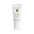White tube of Eminence Kombucha Microbiome Leave-On Masque with gold lettering on a minimalist background