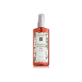 Eminence Mangosteen Revitalizing Mist in an amber translucent plastic bottle with white and green branding.