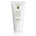 Bottle of Eminence Strawberry Rhubarb Hyaluronic Body Lotion in white and gold packaging