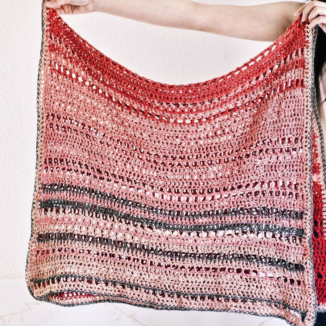 Close-up of En Rose Lap Blanket crochet stitchwork showing open and dense textures