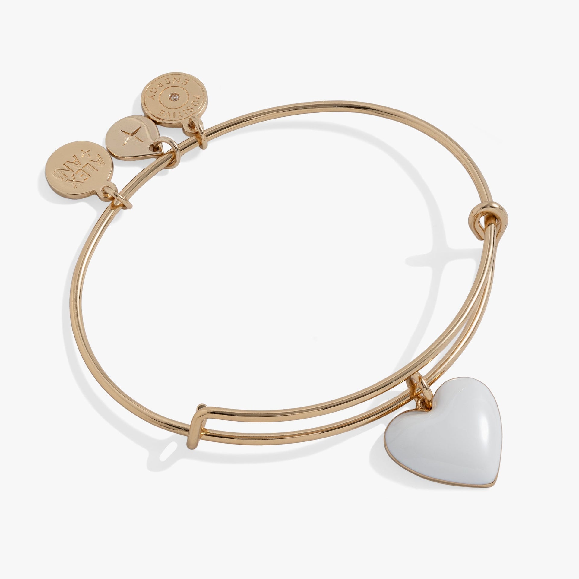 White Enamel Heart Charm bangle on an expandable wire frame.