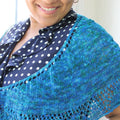 Intermediate level lace shawl in blue and teal silk yarn