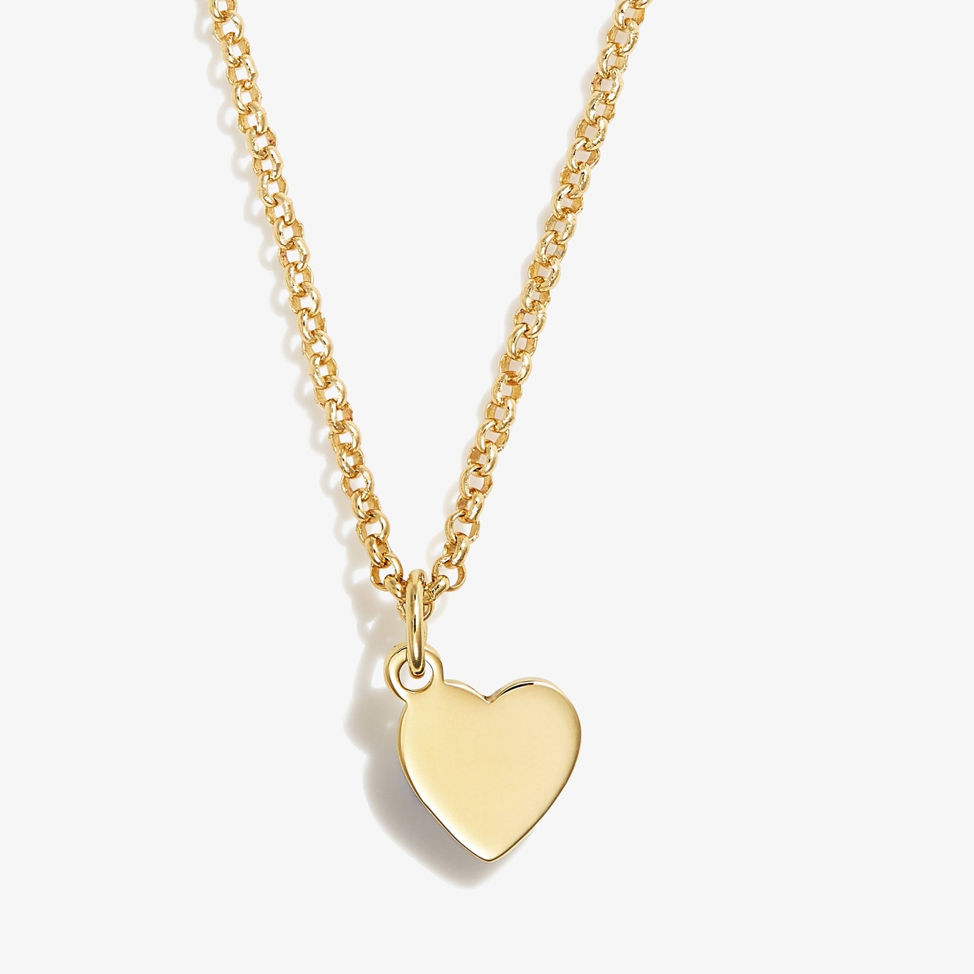 Small gold-tone heart charm necklace on a 19-inch chain