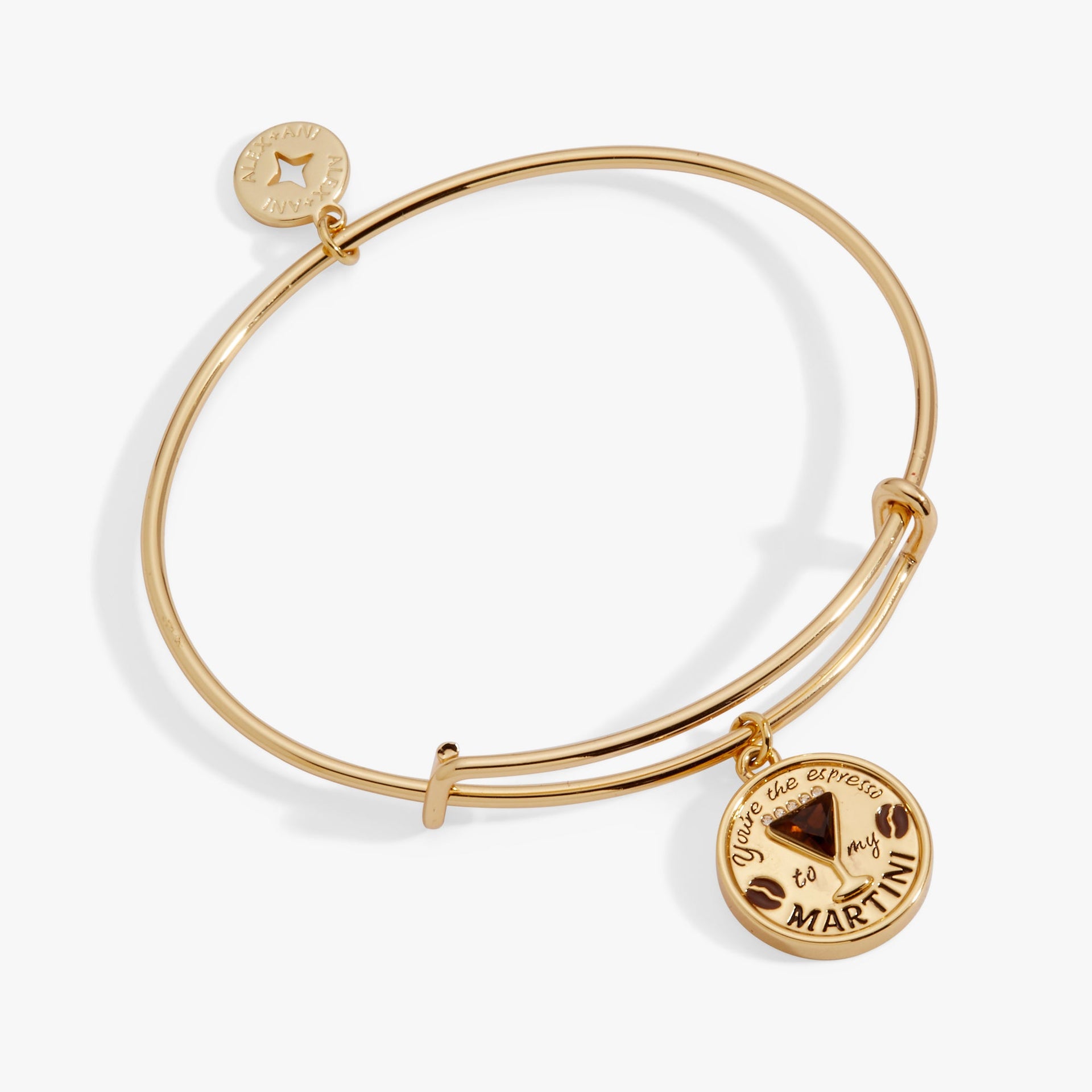 Gold-plated bangle featuring a martini glass charm with smokey quartz, crystals, and enameled espresso beans.