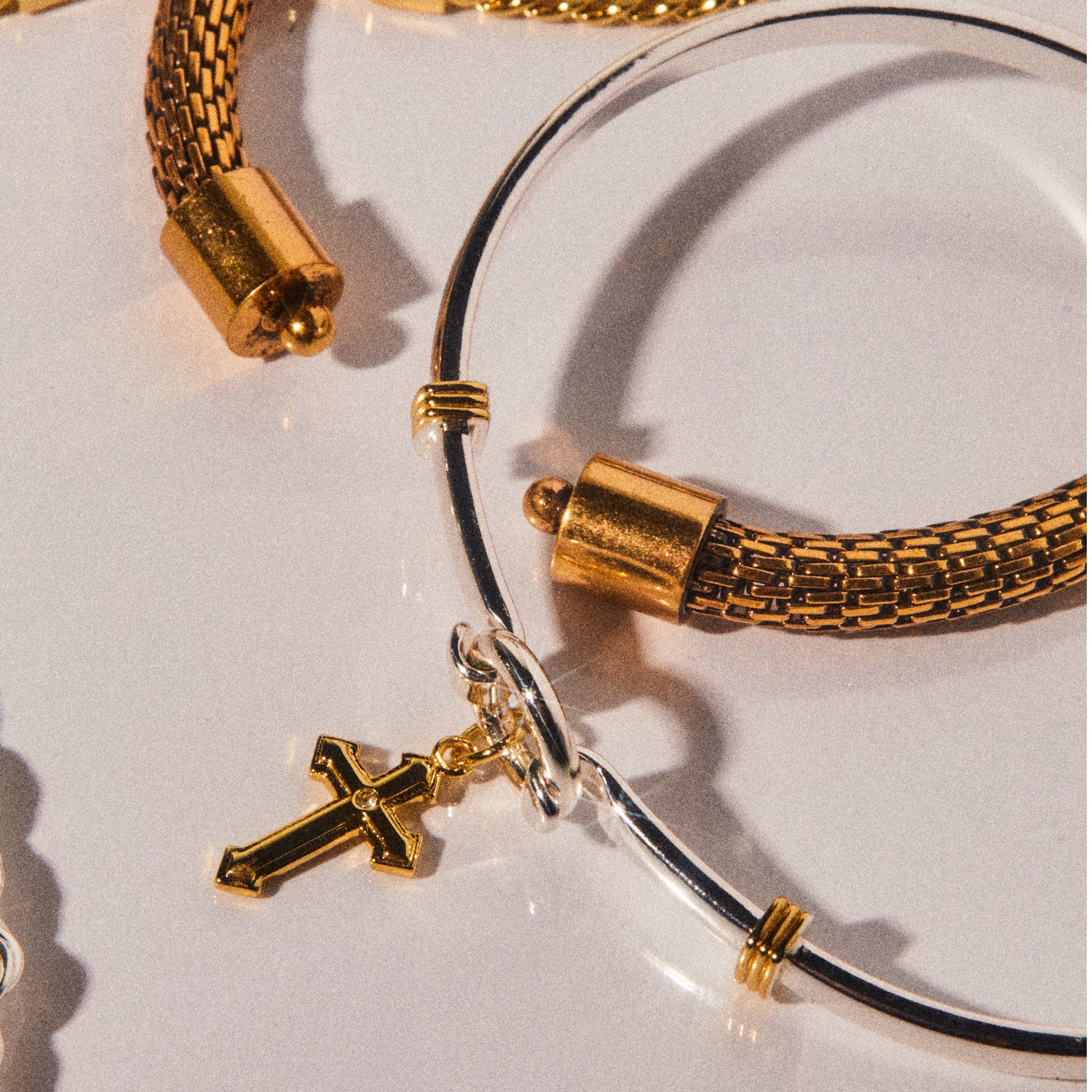 Two-Tone Cross Clip Bangle in Minimalist Religious Design