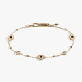 Stainless steel Evil Eye anklet featuring blue crystal charms and adjustable slider chain.
