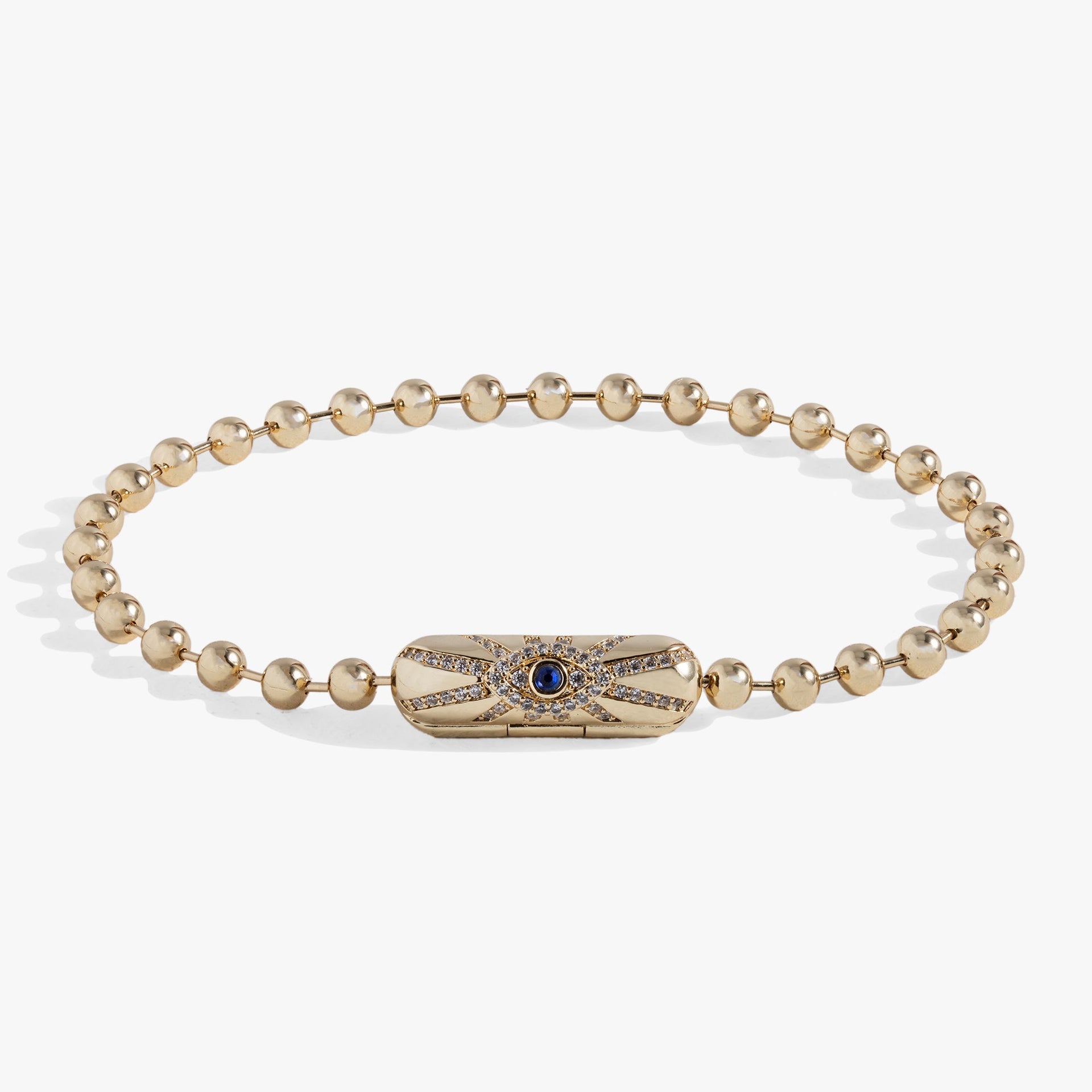 Modern minimalist ball chain bracelet with a magnetic barrel closure and a crystal evil eye charm.