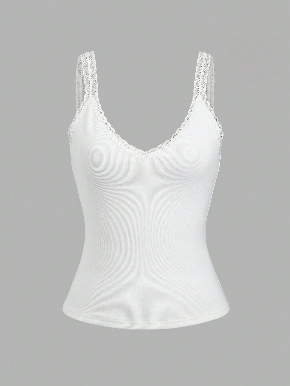 White ribbed tank top with intricate lace detailing on the V-neck and wide shoulder straps against a grey background.