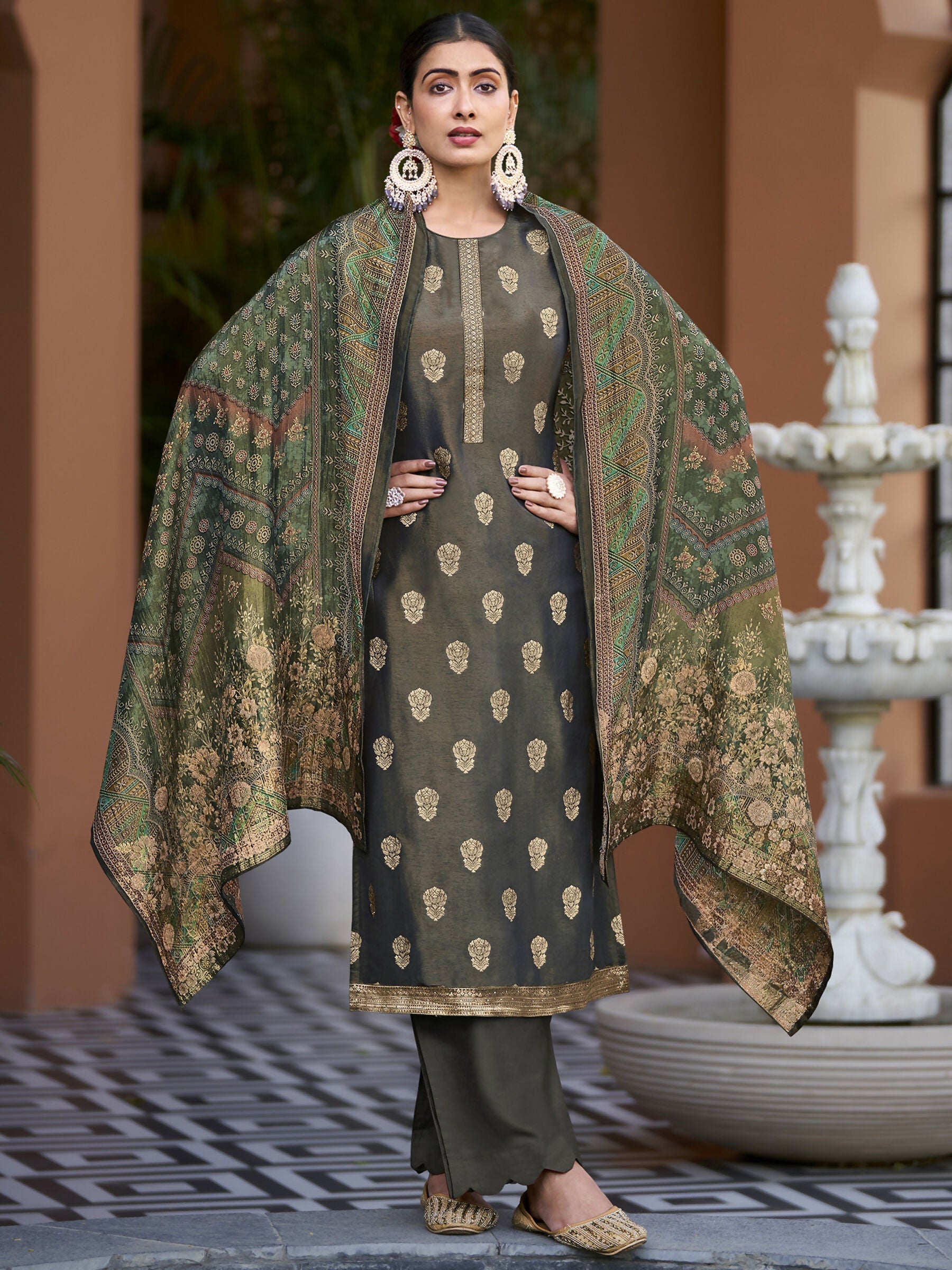 Green pure silk jacquard woven kurta set with Upada silk trousers and dupatta.