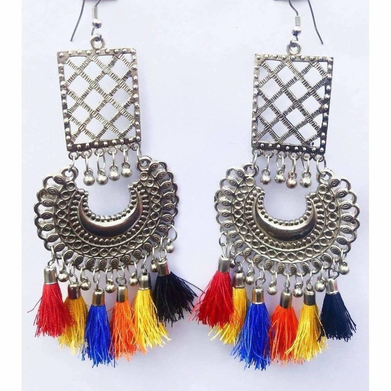 Silver oxidized Chandbali earrings with multi-colored thread accents on a white background.