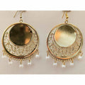 Traditional gold-plated chandbali earrings with mirror work and white glass pearls.