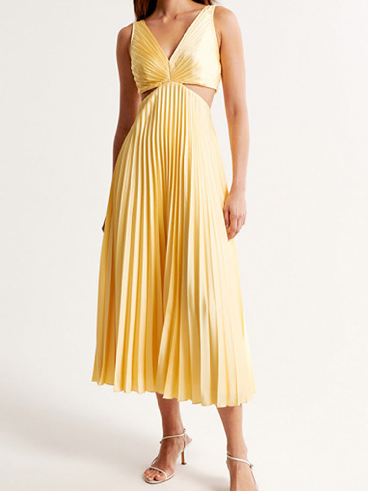 Women wearing a hollow-waisted V-neck backless pleated suspender long dress in solid color