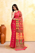 A vibrant red cotton blend Jamdani saree with delicate embellishments displayed elegantly.