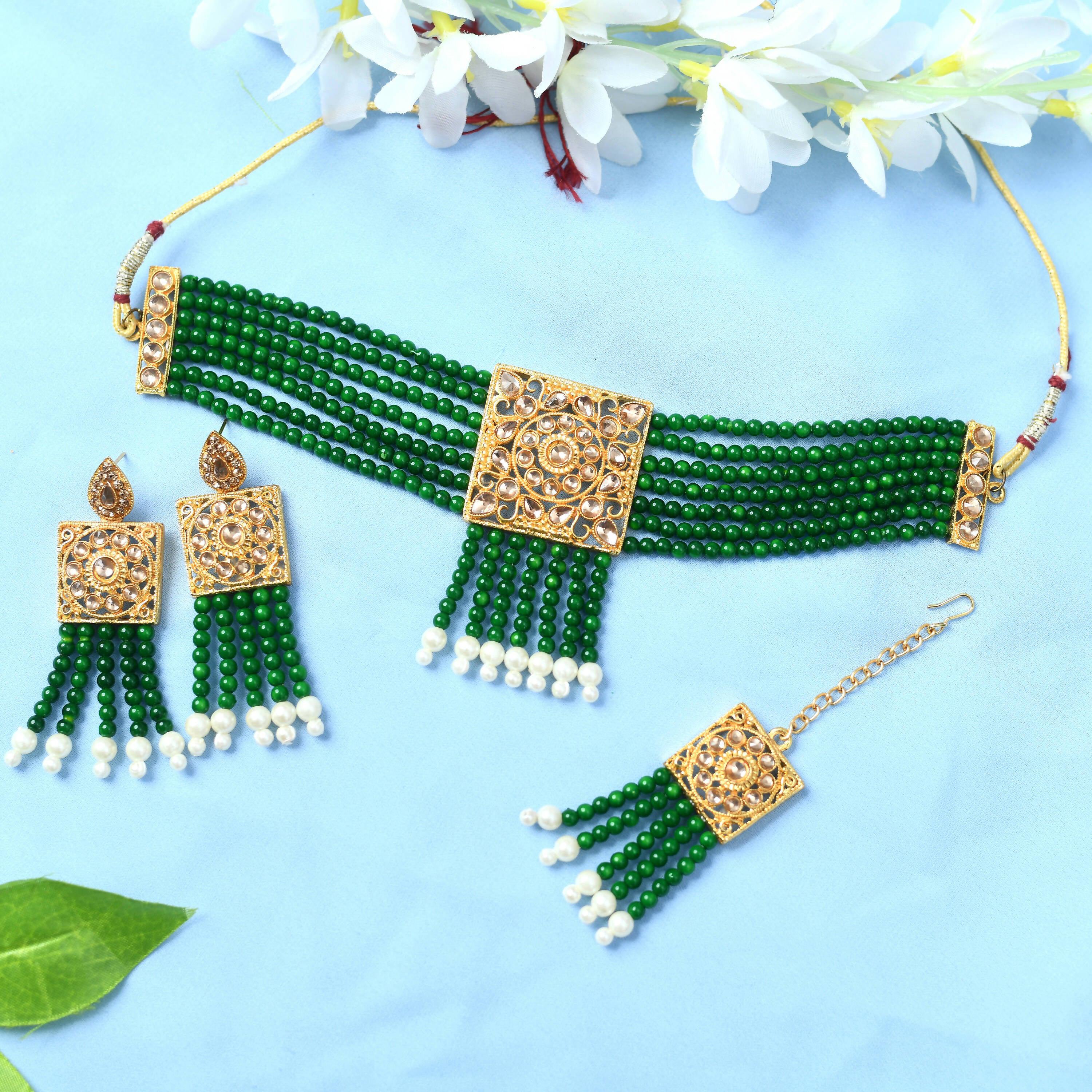 Gold-polished Kundan and pearl choker necklace in green and golden colors