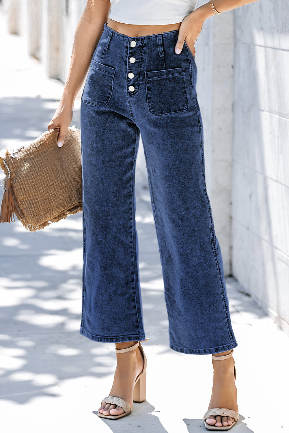 Blue wide leg cropped denim jeans with button-front detail