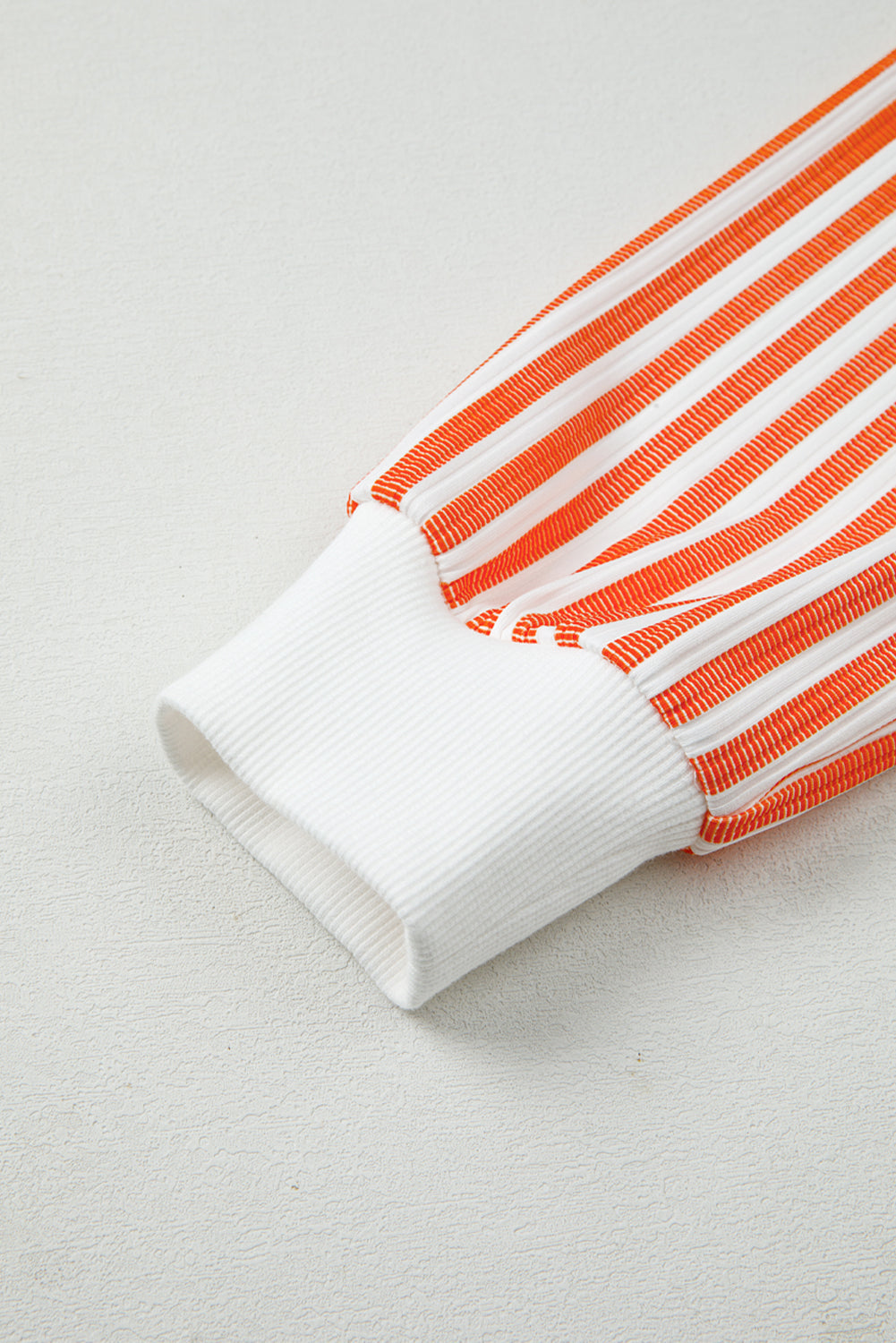 White Long Sleeve Top with Orange Striped Accents and V-Neck