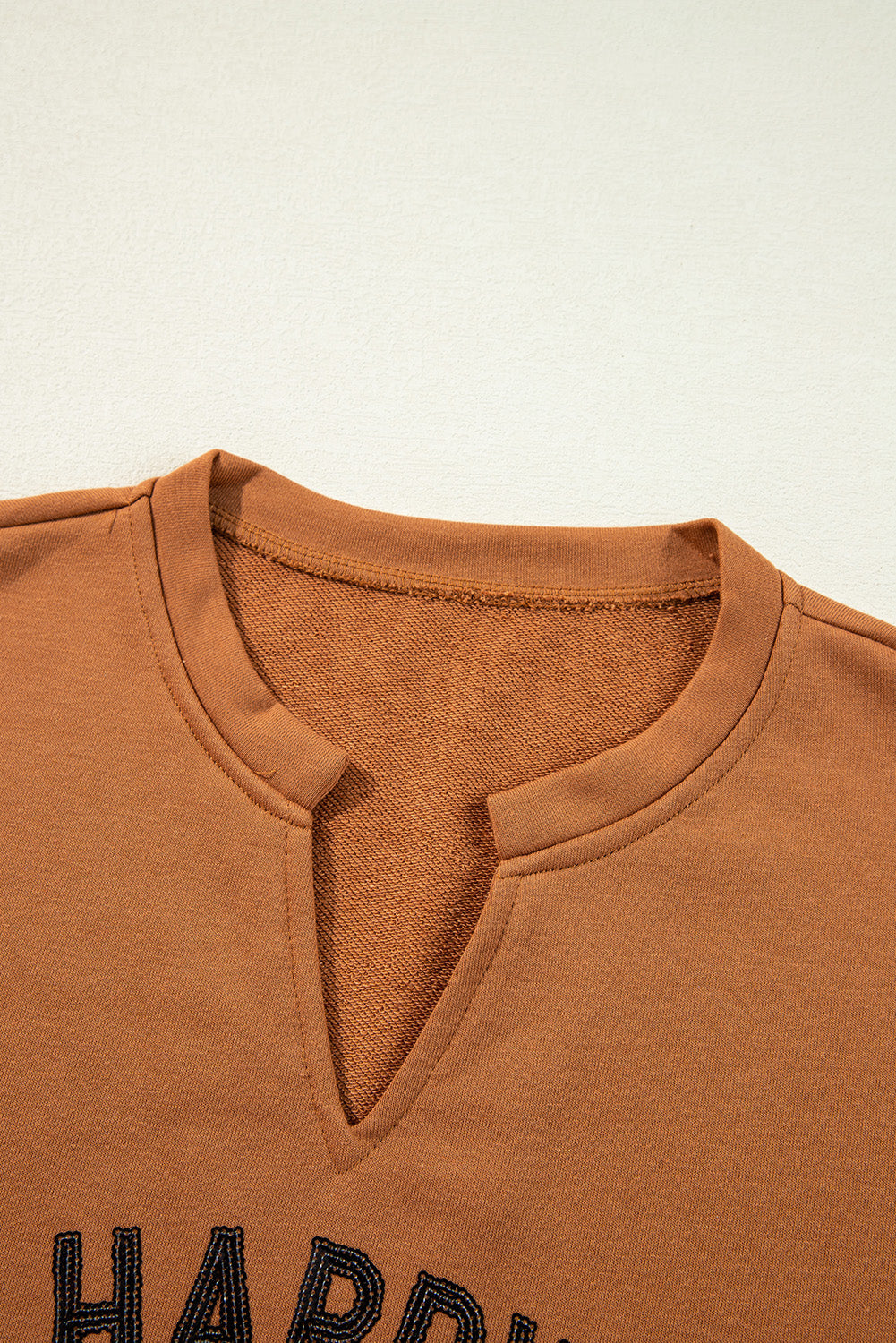 Chestnut Sequin Happy Halloween Graphic Notched Neck Loose Top