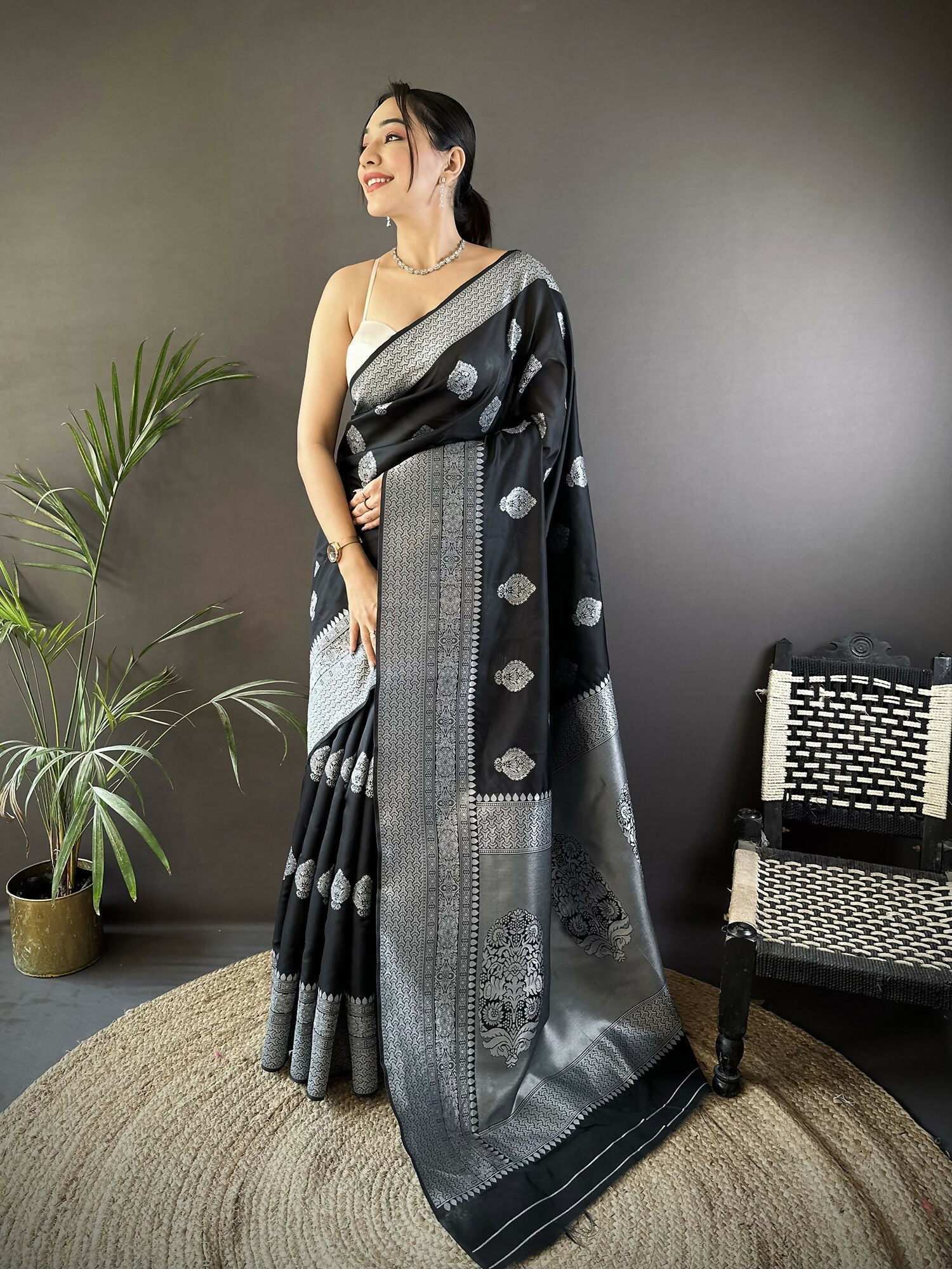 Black Soft Silk Banarasi Saree with floral motifs and matching blouse
