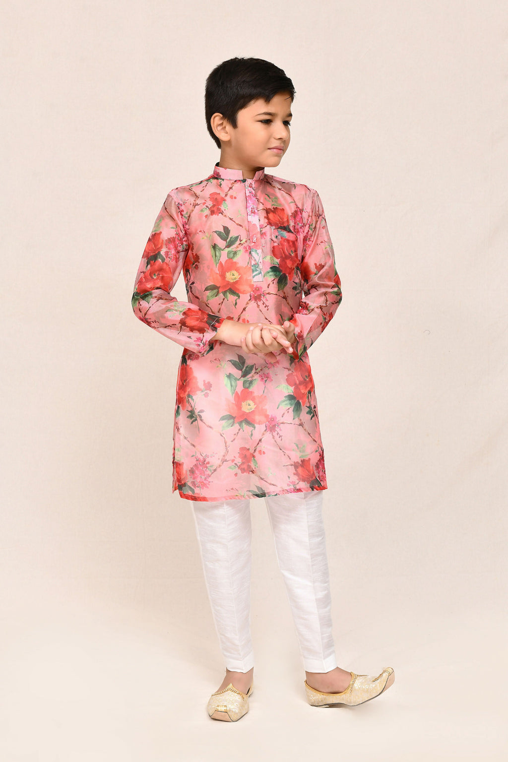 Soft Peach Georgette Kurta paired with white straight-fit trousers