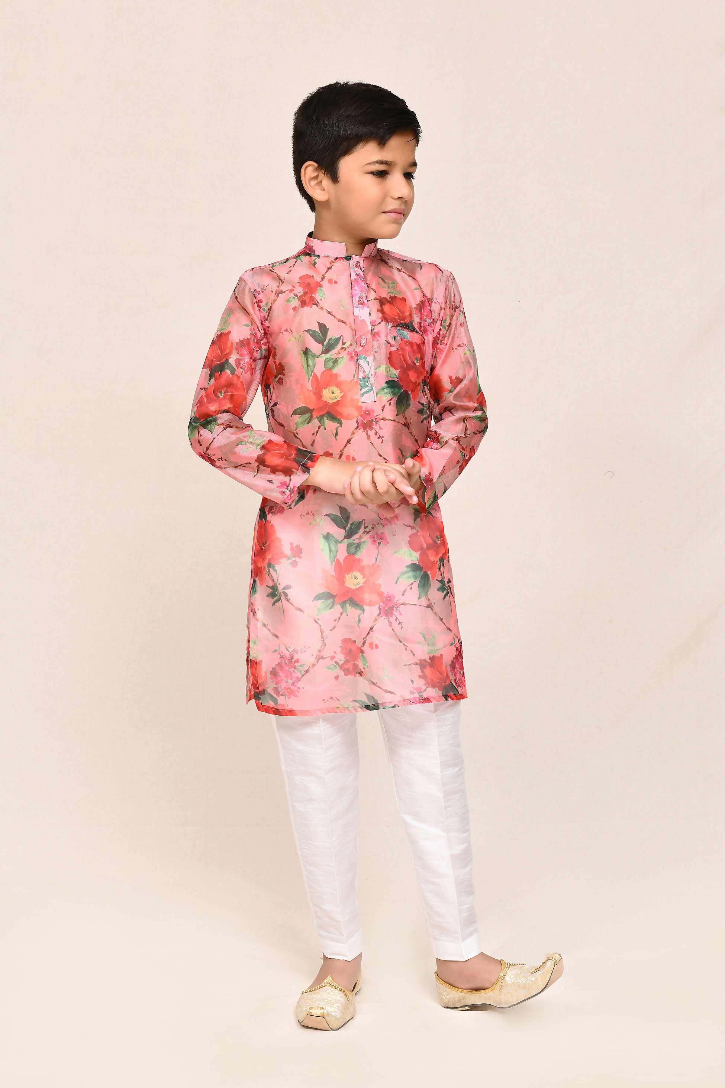 Soft Peach Georgette Kurta paired with white straight-fit trousers