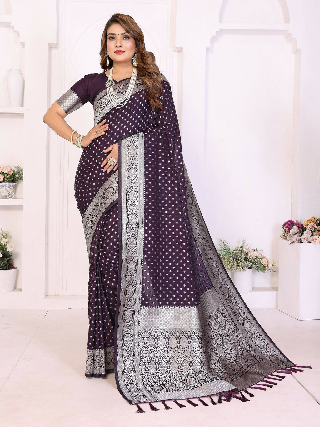Purple Georgette Silk saree with Zari weaving details on the border.
