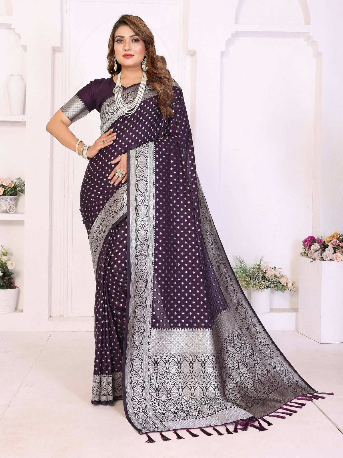 Purple Georgette Silk saree with Zari weaving details on the border.